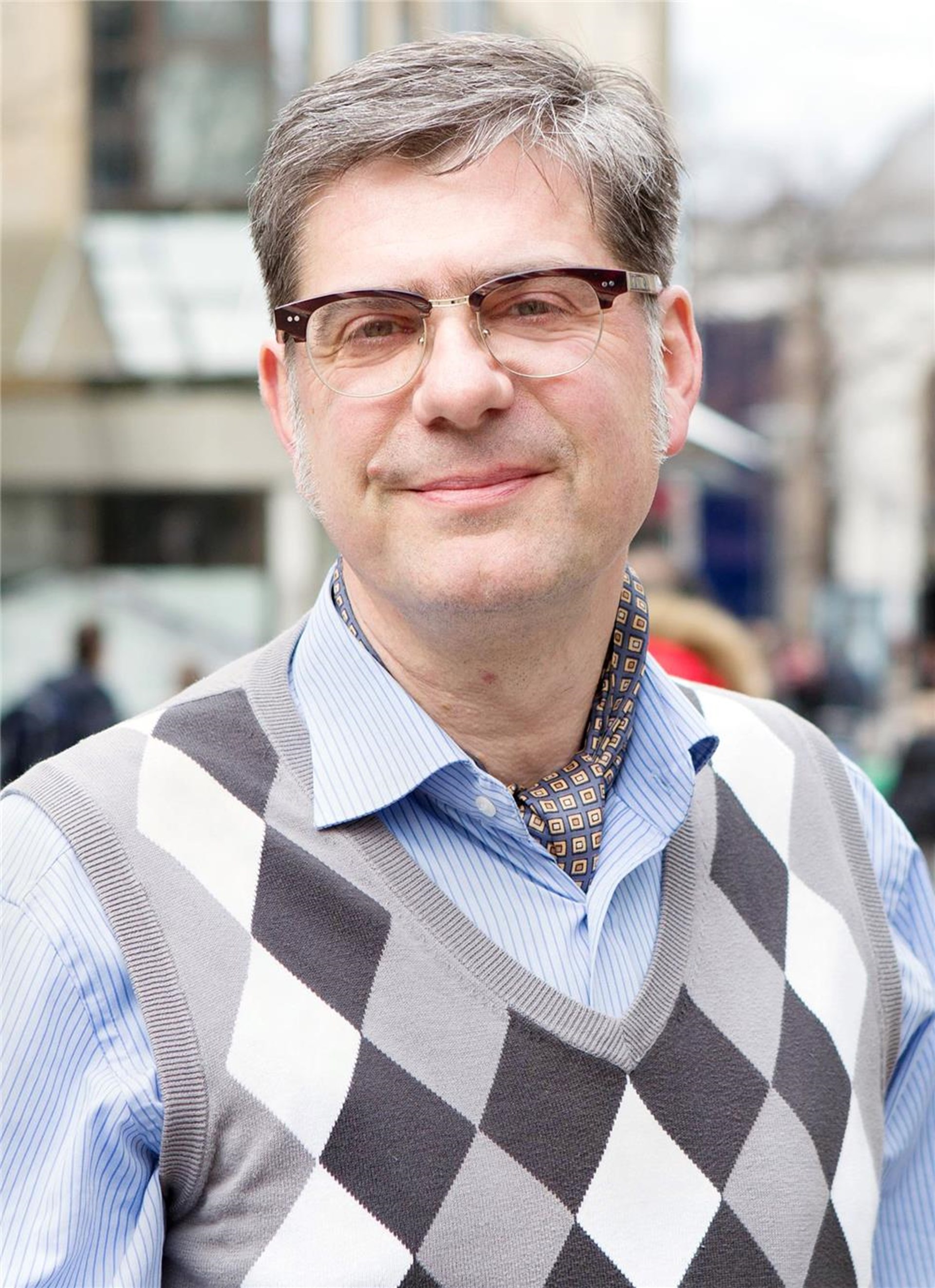 Portrait von Christoph Grätz-Kraft, einem Mann mittleren Alters 